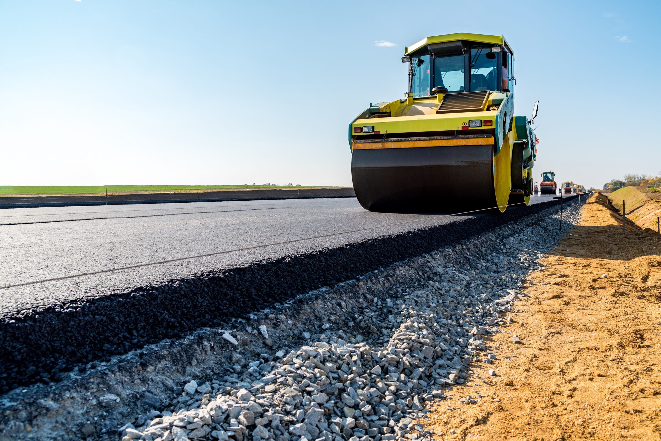Road rollers building the new asphalt road Copyright: FEhs-Institut