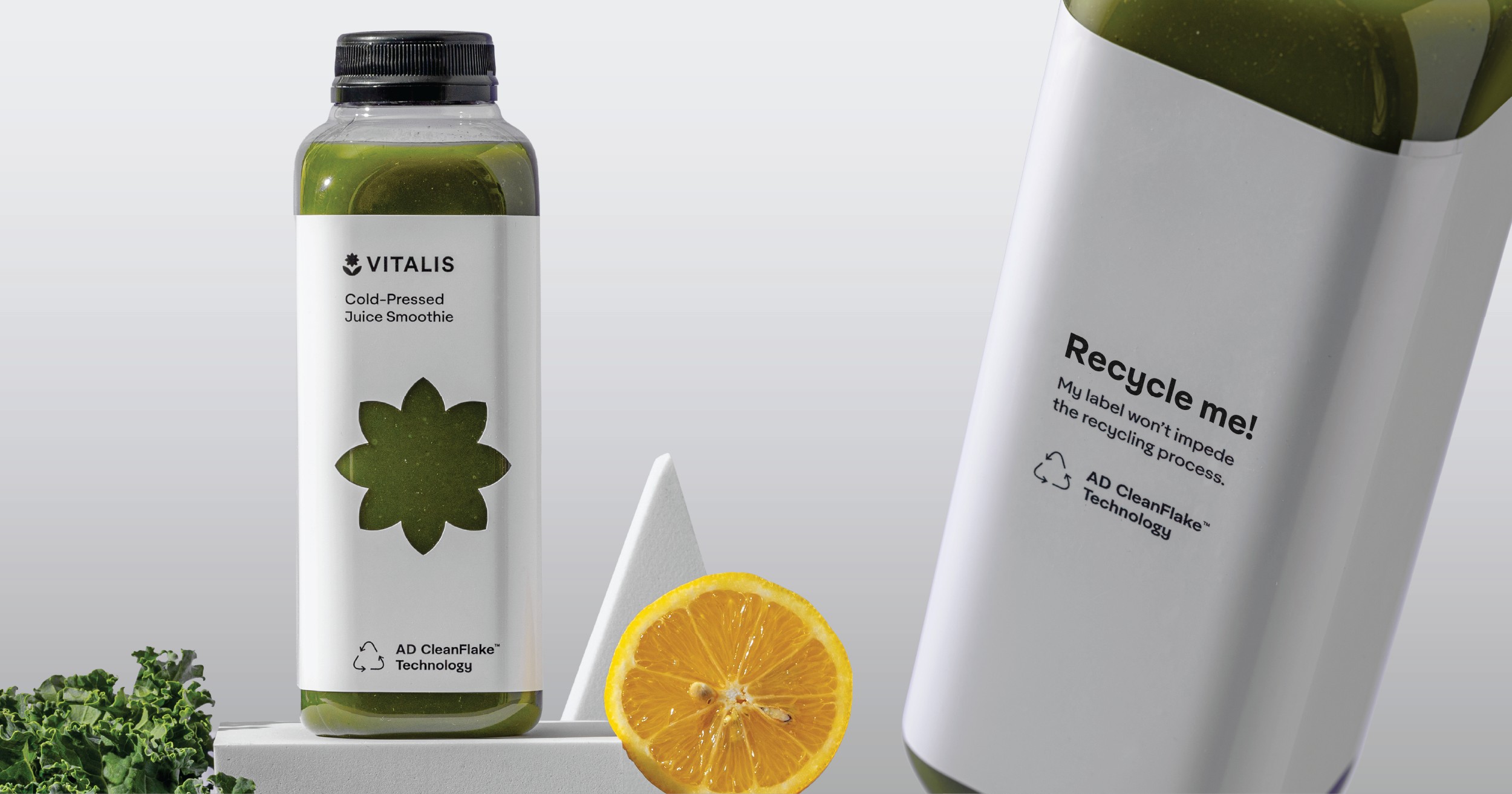 Juice bottles labeled with AD Clean Flake RFID tags, which are designed to separate cleanly from PET during mechanical recycling. (Source: Avery Dennison)